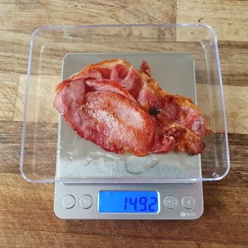 Weight of cooked back bacon slice