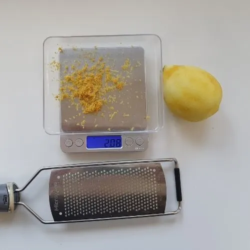 weight of a zested lemon = 2g
