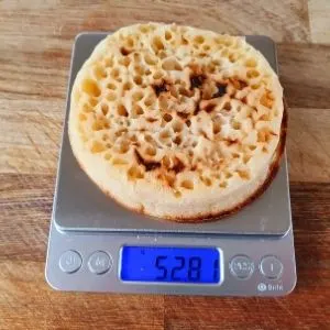 Weighing a crumpet on scales weight is 52g