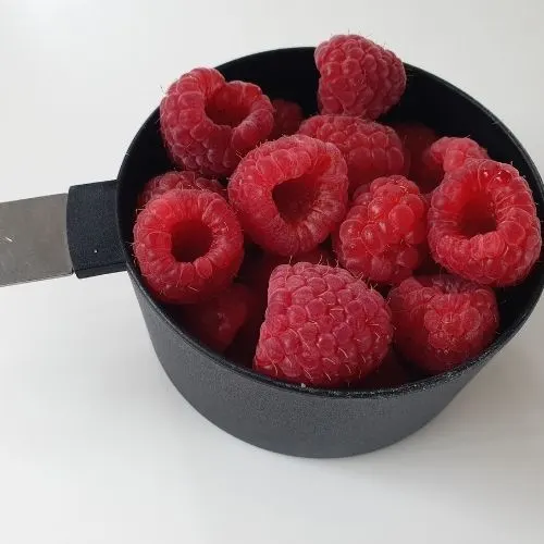 Cup of fresh raspberries