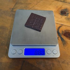 image shows an after eight mint thin on a scale weighing 8.8g