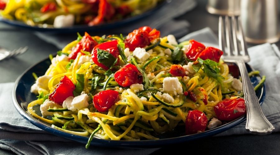 zoodles with tomatoes and fetta cheese