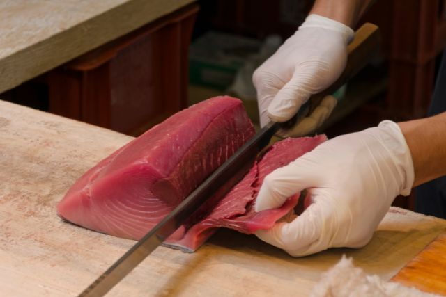 Cutting fresh tuna